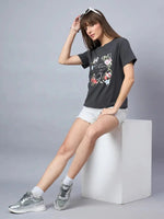 Woman wears 98degreenorth Women’s Relaxed Fit Typography Printed Cotton Tee with white shorts and silver sneakers.