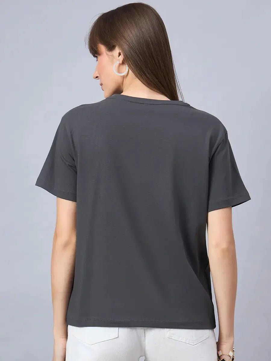 Woman with straight brown hair wears 98degreenorths Street Style Typography Cotton Tee, facing away from the camera.