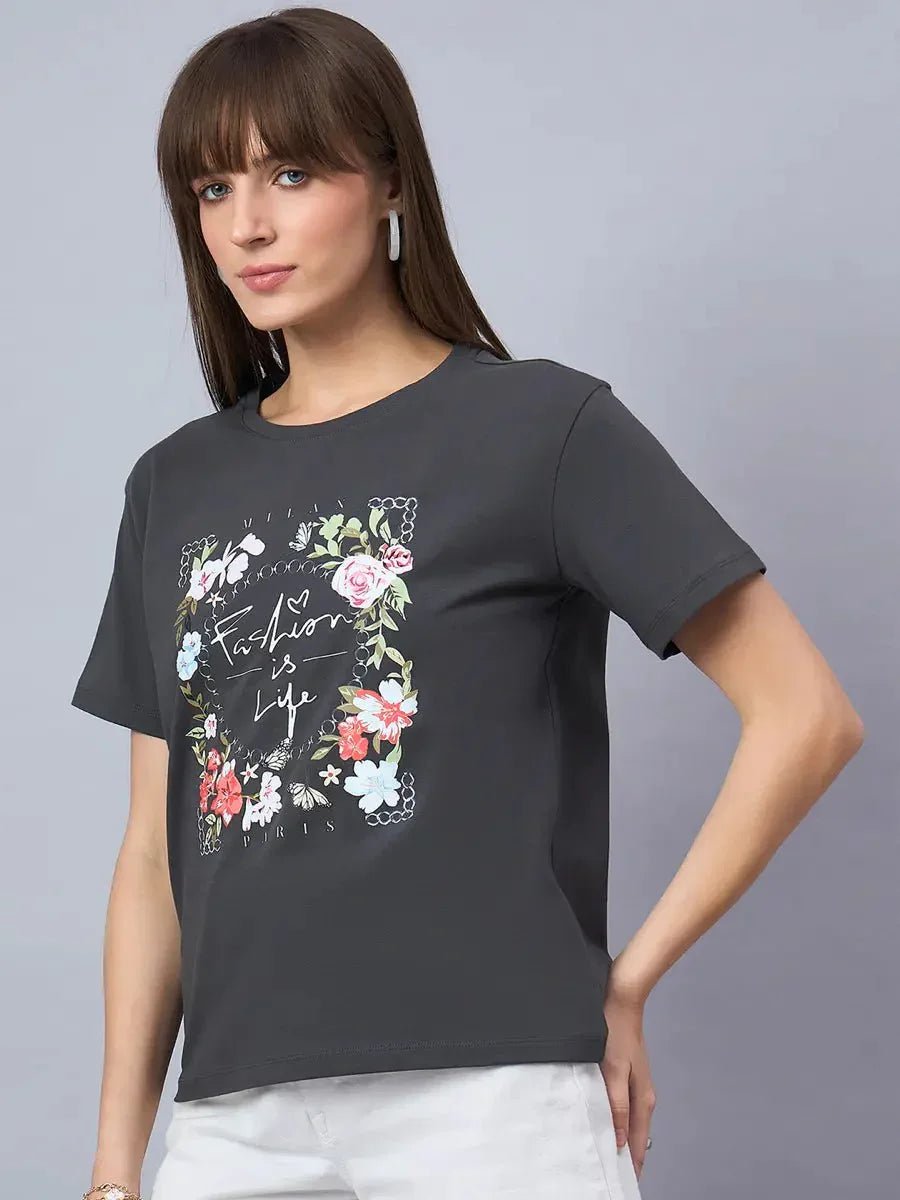 98degreenorth Women’s Relaxed Fit Typography Printed Cotton Tee – Street Style, in dark gray, modeled with hand on hip.