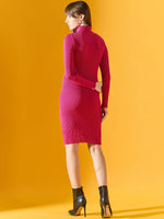 Woman in a 98degreenorth fuchsia ribbed knitted bodycon dress stands against a vivid yellow background.