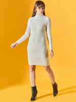 Woman in a 98degreenorth off-white ribbed knitted bodycon turtleneck dress, black ankle boots, and sunglasses.