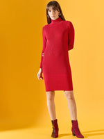 Woman wears 98degreenorth Red Ribbed Knitted Bodycon Turtleneck Dress before a yellow background.