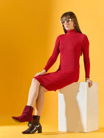 Model wears 98degreenorth’s red ribbed turtleneck bodycon dress, seated against a yellow background.