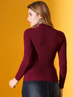 Woman in 98degreenorth Rosewood Ribbed High-Neck Sweater—elegant slim fit winter knit pullover, India style.