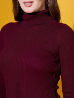 Woman wears 98degreenorth’s rosewood ribbed turtle-neck pullover—chic, slim-fit winter knitwear for India.