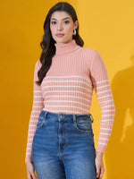 Woman wears 98degreenorth’s Women’s Salmon Ribbed Turtleneck Sweater and blue jeans against a yellow background.