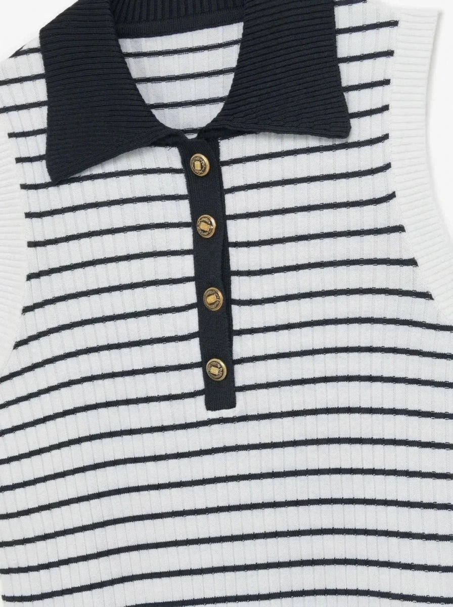 98degreenorth Women's Striped Knit Polo Vest in White & Navy—sleeveless, gold buttons, and black collar for preppy flair.