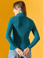 A woman models the 98degreenorth Women’s Teal Blue Ribbed Turtleneck Slim Fit Sweater—stylish winter wear in India.