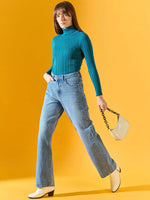 Woman wears 98degreenorth Teal Blue Ribbed Turtleneck Sweater—stylish, slim-fit winter wear for casual looks in India.