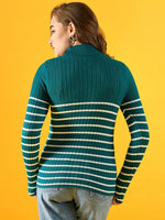 Woman in a 98degreenorth teal ribbed knit turtleneck sweater, facing away on a bright yellow background.