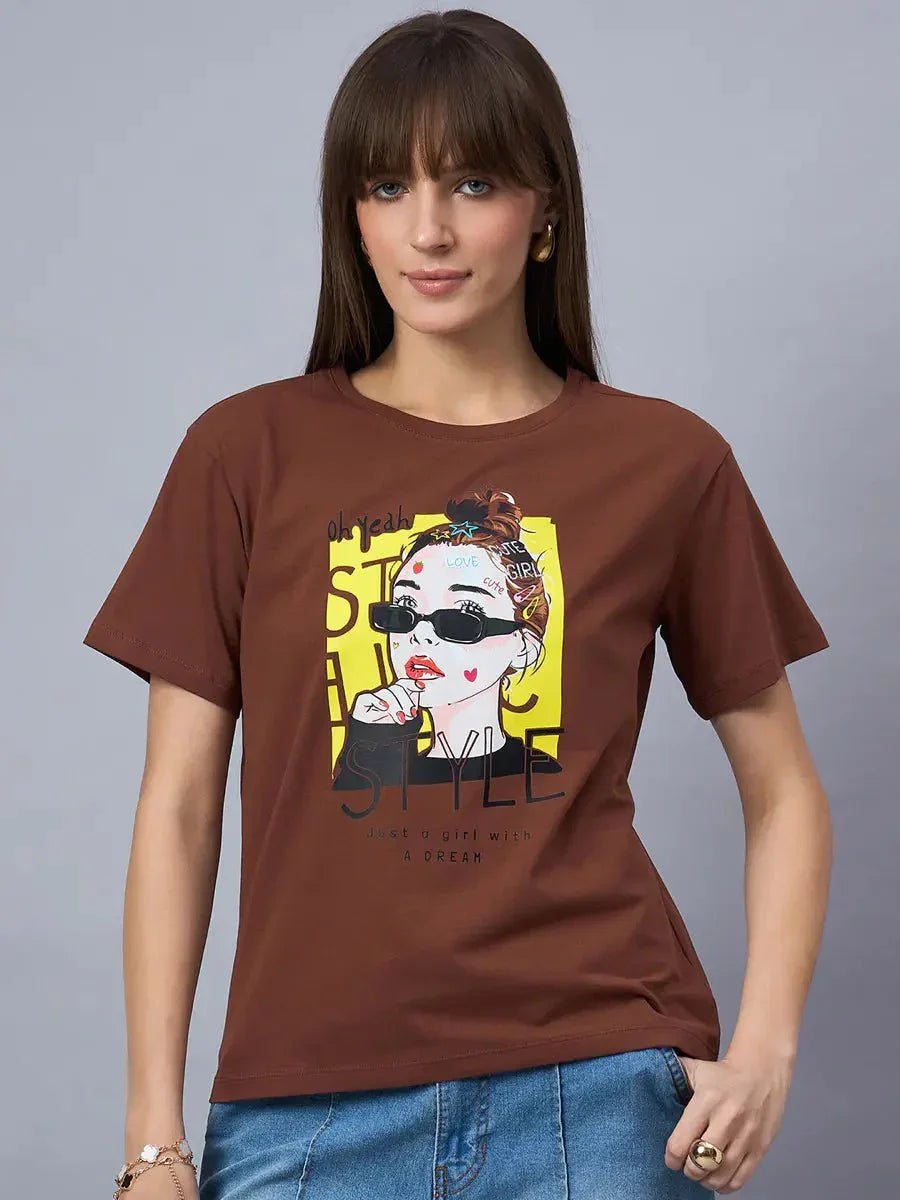 Woman in a 98degreenorth Women’s Typography Graphic Cotton T-shirt—stylish streetwear with “STYLE” print.