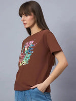 Woman wearing 98degreenorth Women’s Typography Graphic Print Cotton Tee – Streetwear Essential, hand in pocket.