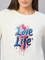 Woman in a 98degreenorth Typography Cotton T-shirt—round neck, streetwear style with colorful Love Life print.