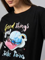 Close-up of a woman in the 98degreenorth Women’s Typography Printed Cotton Tee – Comfortable Streetwear.