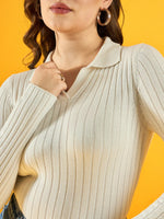 Woman in a 98degreenorth Women's White Ribbed Collar Neck Sweater, posing against a yellow background.